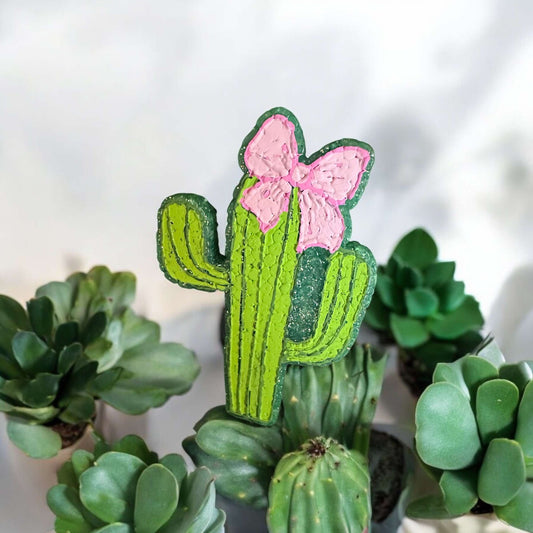 Trendy cactus with a bow